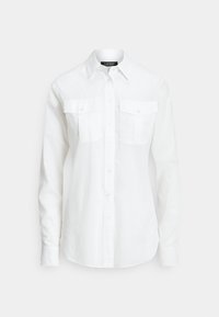 Camisa branca de botões feita de tecido texturizado, com gola pontiaguda, mangas compridas e dois bolsos no peito com abas de fecho.