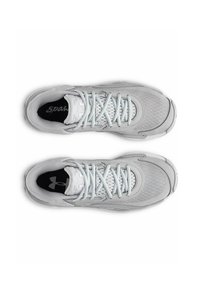 Light grey athletic shoes with mesh panels, flat laces, and padded collar. Features a black insole with logo and textured sole for grip.