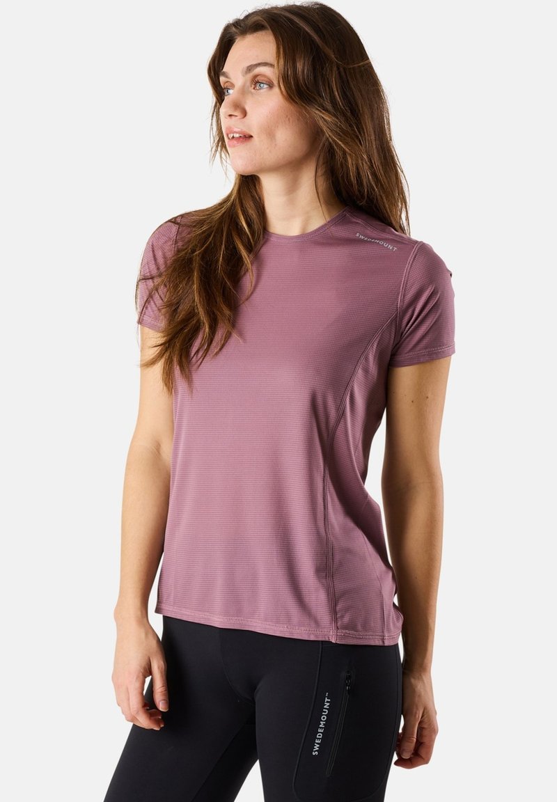 Short-sleeve, crew-neck athletic shirt in light mauve, textured material with subtle vertical stripes and logo on left shoulder.