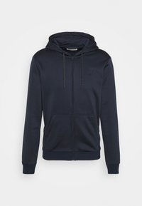 Marineblå hættetrøje med lynlås, snøre i hætten, forlommer og ribstrikkede manchetter. Blødt stof med et enkelt design og lille logodetalje.