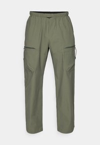 Olive green cargo pants made of lightweight fabric, featuring an elastic waistband, side zip pockets, and a relaxed fit.