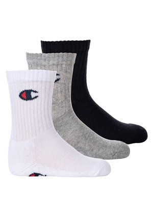 Tre paia di calze in bianco, grigio e nero; texture a coste; ciascuna con un logo nell'area della caviglia; design alla caviglia.