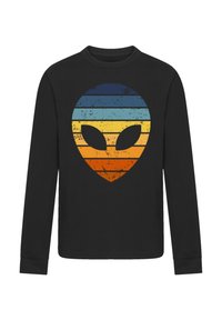 Schwarzes Langarmshirt mit einem mehrfarbigen Alienkopf-Graphic und horizontalen Streifen in Blau, Gelb und Orange.