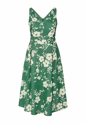 Grünes Blumenkleid mit V-Ausschnitt, figurbetontem Oberteil und ausgestellt Rock. Enthält weiße Blumen und Blätter in einem sich wiederholenden Muster.