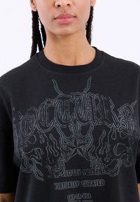 YOURTURN UNISEX - Print T-shirt - black