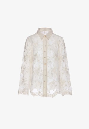 Langærmet gennemsigtig beige bluse med blomsterbroderi, knaplukning foran, bølget kant og spids krave.