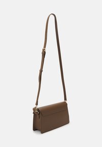 Brown leather crossbody bag with a flap closure, adjustable strap, and gold-tone hardware, featuring a sleek rectangular shape.