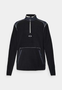 Fleece pullover in black with a high collar, half-zip front, two side pockets, and contrast stitching in gray and navy accents.