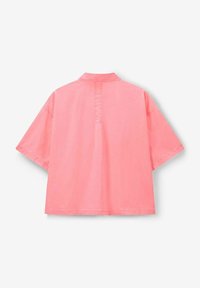 Short-sleeve shirt, lightweight cotton in bright pink, back features a small collar and a vertical seam down the center.