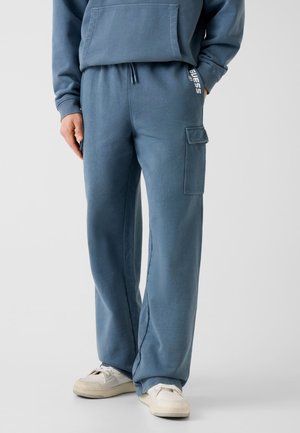 - Spodnie treningowe