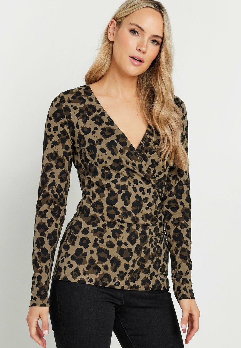 Langärmeliges Oberteil in Olivgrün mit schwarzem Leopardenmuster, ausgestattet mit einem tiefen V-Ausschnitt und figurnahen Schnitt. Hergestellt aus weichem, elastischem Material.