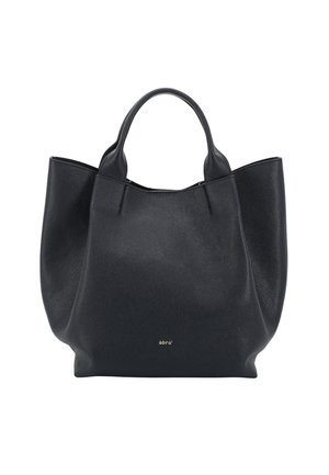 Black leather tote bag with a soft texture, wide open top, two sturdy handles, and a small gold logo accent on the front.