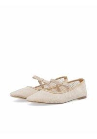 Bailarinas nude con punta afilada, que presentan un upper texturizado con pequeños rhinestones y tiras decorativas a través del empeine.
