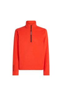 Oranje lange mouwen pullover met een hoge kraag, halve ritssluiting aan de voorkant en Polartec-logo op de mouw. Glad textuur.