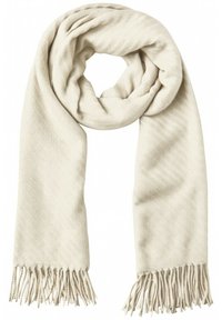 Écharpe beige confectionnée dans un matériau doux, avec une surface texturée et des bords frangés. Elle est enroulée pour l'exposition, mettant en valeur sa longueur.