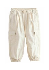 Beige cargobukser med elastisk talje og snor, udstyret med sidelommer og elastiske manchetter ved anklerne. Letvægtsmateriale.