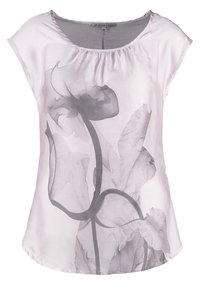 Blusa a maniche corte lilla con scollo arricciato, presenta una stampa floreale traslucida in grigio, con una vestibilità ampia e una texture liscia.