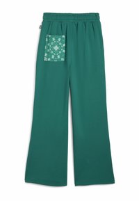 Teal vida byxorna med elastisk midja och en enda bakficka med ett vitt stjärn- och blommönster.