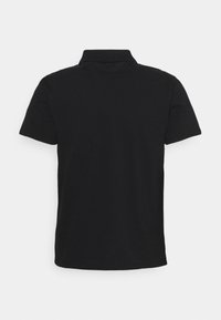 Polo noir à manches courtes, en coton, doté d'un col classique et d'un design uni avec une texture lisse.