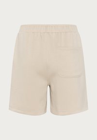 Shorts en coton beige avec une taille élastique. Comprend une poche arrière unique, une coupe décontractée et une texture lisse.