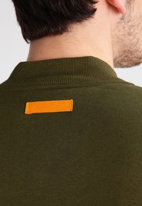 Reebok Classic Tröja med dragkedja - olive