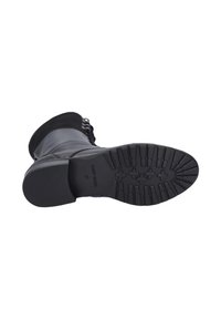 Botte de cheville en caoutchouc noir avec semelle texturée, accents en lacets et un dessus en daim doux. Taille indiquée comme 37.
