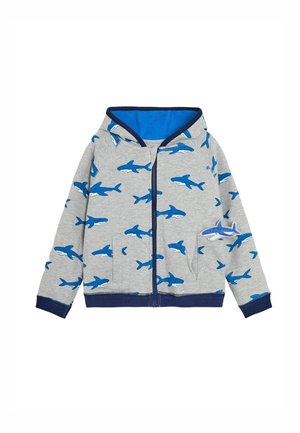 Pilkas zip-up hoodie su mėlynu ryklių raštu, mėlyna vidaus pamušalu ir tamsiai mėlynomis rankovėmis. Funkcionalios kišenės abiejose pusėse.