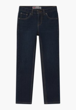 Jean en denim bleu foncé à coupe slim, avec cinq poches, des coutures contrastantes et une fermeture par bouton. Lavable en machine, design à jambe droite.