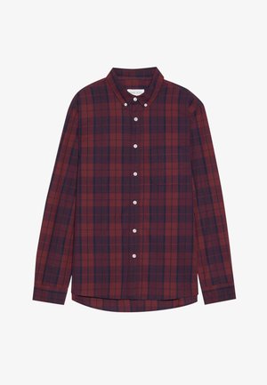 Camicia a quadri rossa e blu con bottoni. Presenta maniche lunghe, colletto a punta e una tasca sul petto. Orlo dritto. Tessuto in cotone.