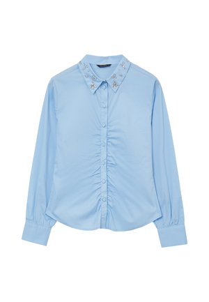Light blue long-sleeve shirt with a button-up front, gathered detail at the waist, and a collar embellished with clear gems.