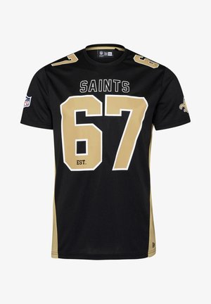 Czarny jersey futbolowy New Orleans Saints z złotym numerem 67, nazwą drużyny oraz logotypami NFL i fleur-de-lis na rękawach.