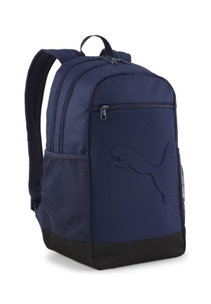 Navy blue synthetic backpack with padded straps, front zip pocket, mesh side pocket, and a textured Puma logo on the front.