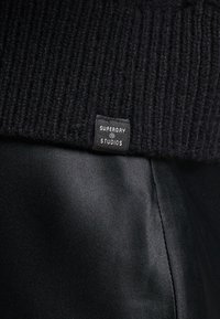 Superdry & Co Stickad tröja - black