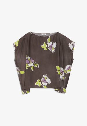Haut ample marron à manches larges, présentant un motif floral en blanc, violet et vert.