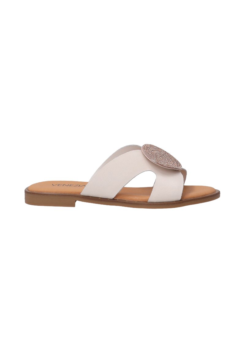 White leather slide sandal with an oval, textured rose gold accent. Open-toe design with dual straps and a flat brown sole.