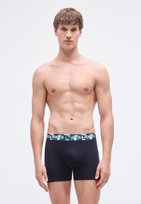 Boxeri scurți negri cu talie modelată cu frunze tropicale și flamingo, realizați din bumbac moale, design ajustat.