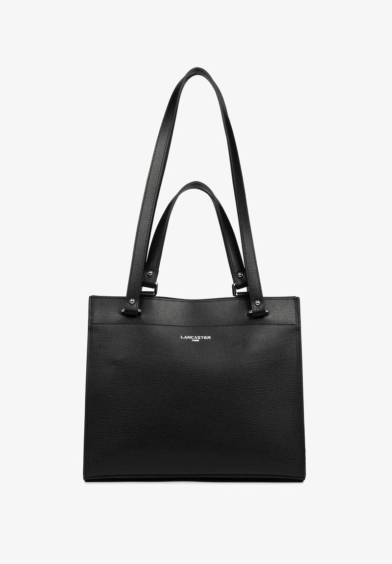 Sac cabas en cuir noir avec un design structuré, deux anses épaules et une texture lisse. Présente un détail de logo argenté au centre.