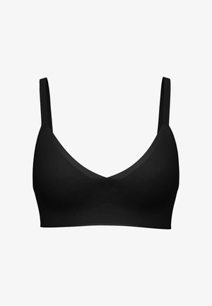 Black wireless bra with thin adjustable straps and smooth seamless cups designed for comfort and support.