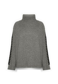 Szary sweter z golfem o teksturowanym splocie, z czarną koronką zdobiącą rękawy jako akcent. Luźny krój, długie rękawy.