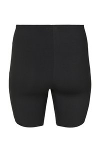 Schwarze, eng anliegende Shorts bis zum Knie mit glatter Textur und einfachen Nahtdetails entlang des Bunds und der mittleren Naht.