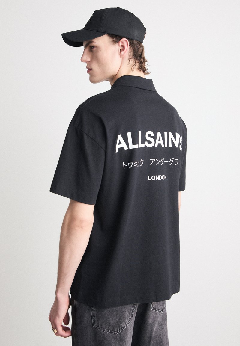 AllSaints - UNDERGROUND - Polo shirt - jet black, Enlarge