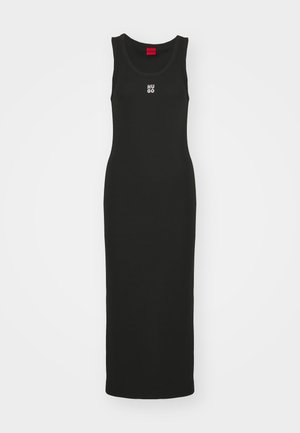 Black sleeveless maxi dress with a fitted silhouette. Made of smooth fabric featuring a white "HUGO" logo on the chest. Simple and seamless design.