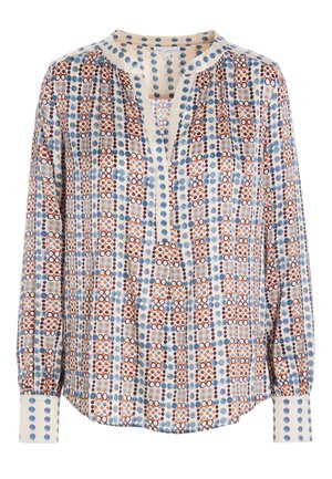 Blouse à manches longues avec base beige, ornée de motifs circulaires et carrés bleus, bruns et orange, dotée d'un col rond et de manches à poignets.