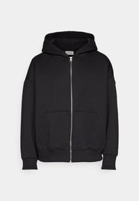 Black zipper hoodie made of soft fabric, featuring a hood, front pockets, and ribbed cuffs. Simple, minimalist design without patterns.