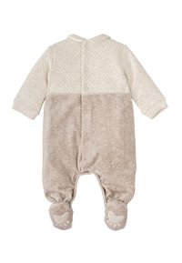 Mono para bebé acolchado en crema y beige, con cuello, botones a presión, textura suave y acentos de huellas de patas en los pies.