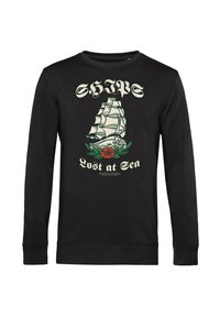 Maglietta nera a maniche lunghe con grafica di una nave a vela, foglie verdi, fiore rosso e la scritta "NAVI Perse in Mare Triangolo delle Bermuda."