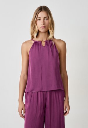 Top morado sin mangas con cuello halter y detalle en forma de llave, hecho de una tela suave y lisa, con un corte relajado y un diseño sin estructura.