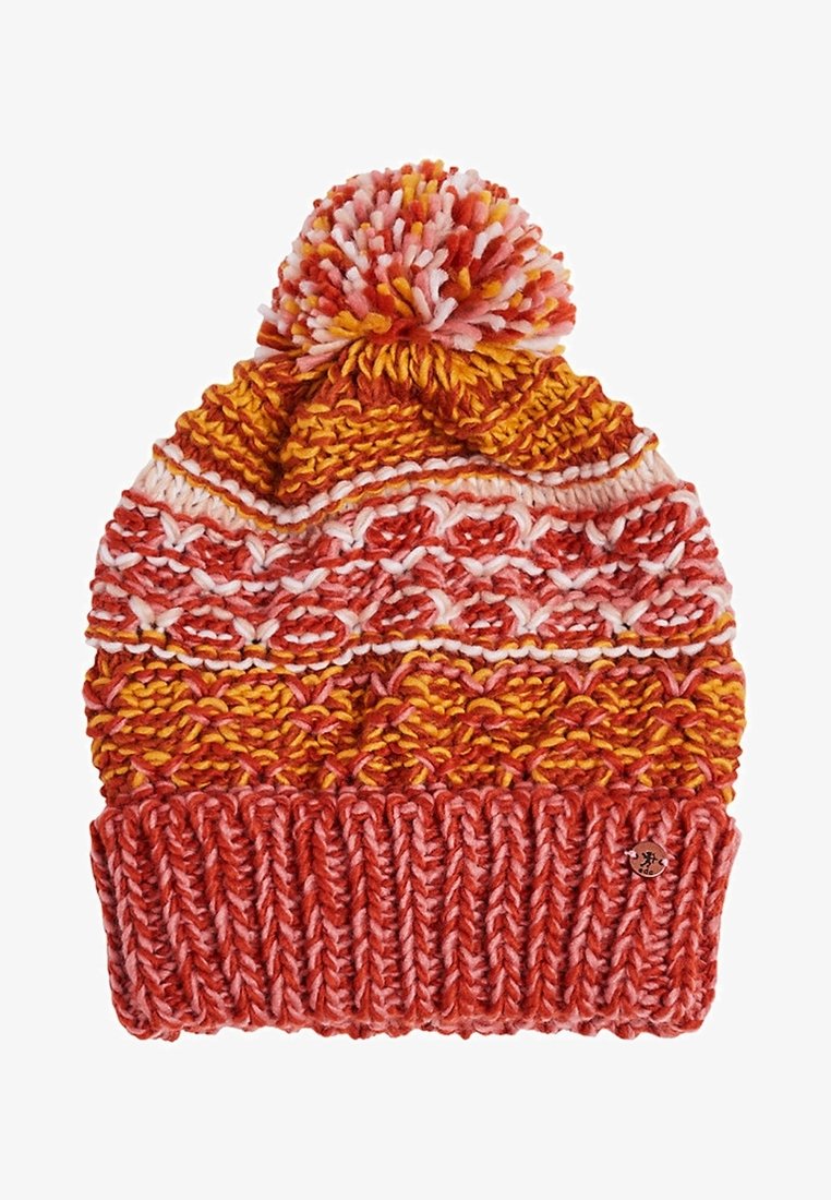 Bonnet d'hiver tricoté coloré avec des rayures orange, rouges, jaunes et roses et un grand pompon multicolore sur le dessus.