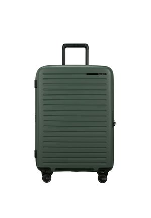 Hard-shell suitcase in olive green. Horizontal stripe design, black telescopic handle, and four multi-directional wheels for easy maneuverability.