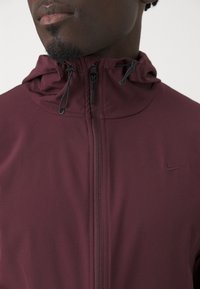 Nike Performance UNLIMITED - Träningsjacka - burgundy crush/black